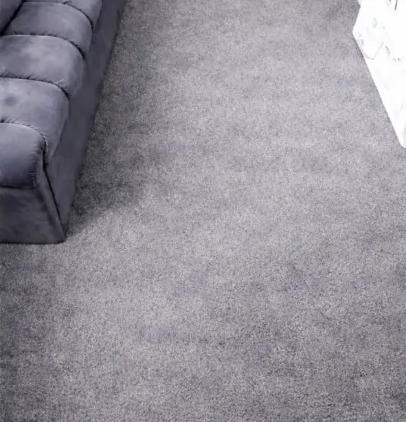 After: the same carpet after steam cleaning