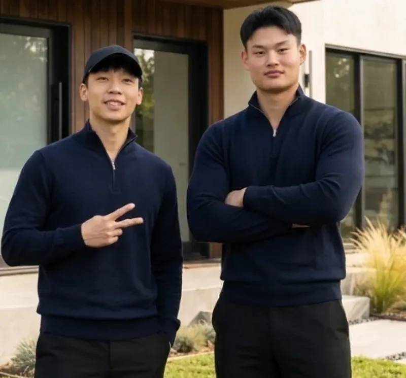 Alex and Justin, the two owners of AJPresentations, outside a client's home