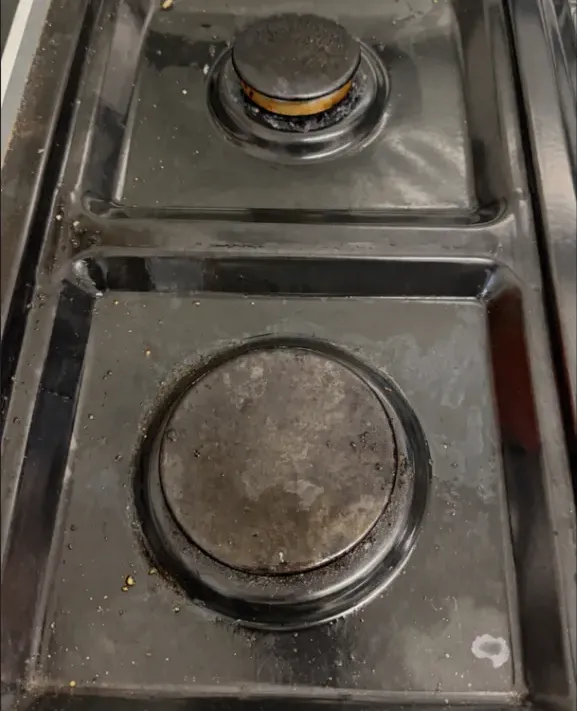 Before: burnt-on grime on the stovetop burners